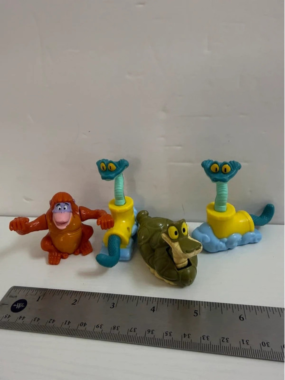 Disneys the Jungle Book small figurines.